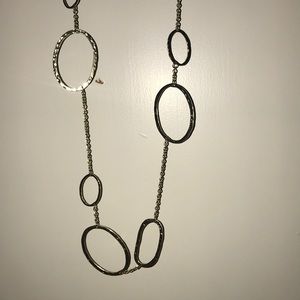 Long gold necklace
